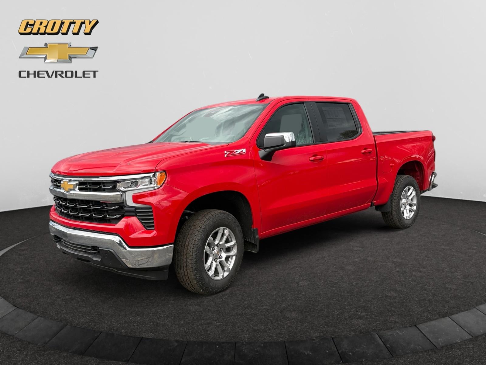 2026 Chevrolet Silverado 1500 LT in Red Hot — front three-quarter view
