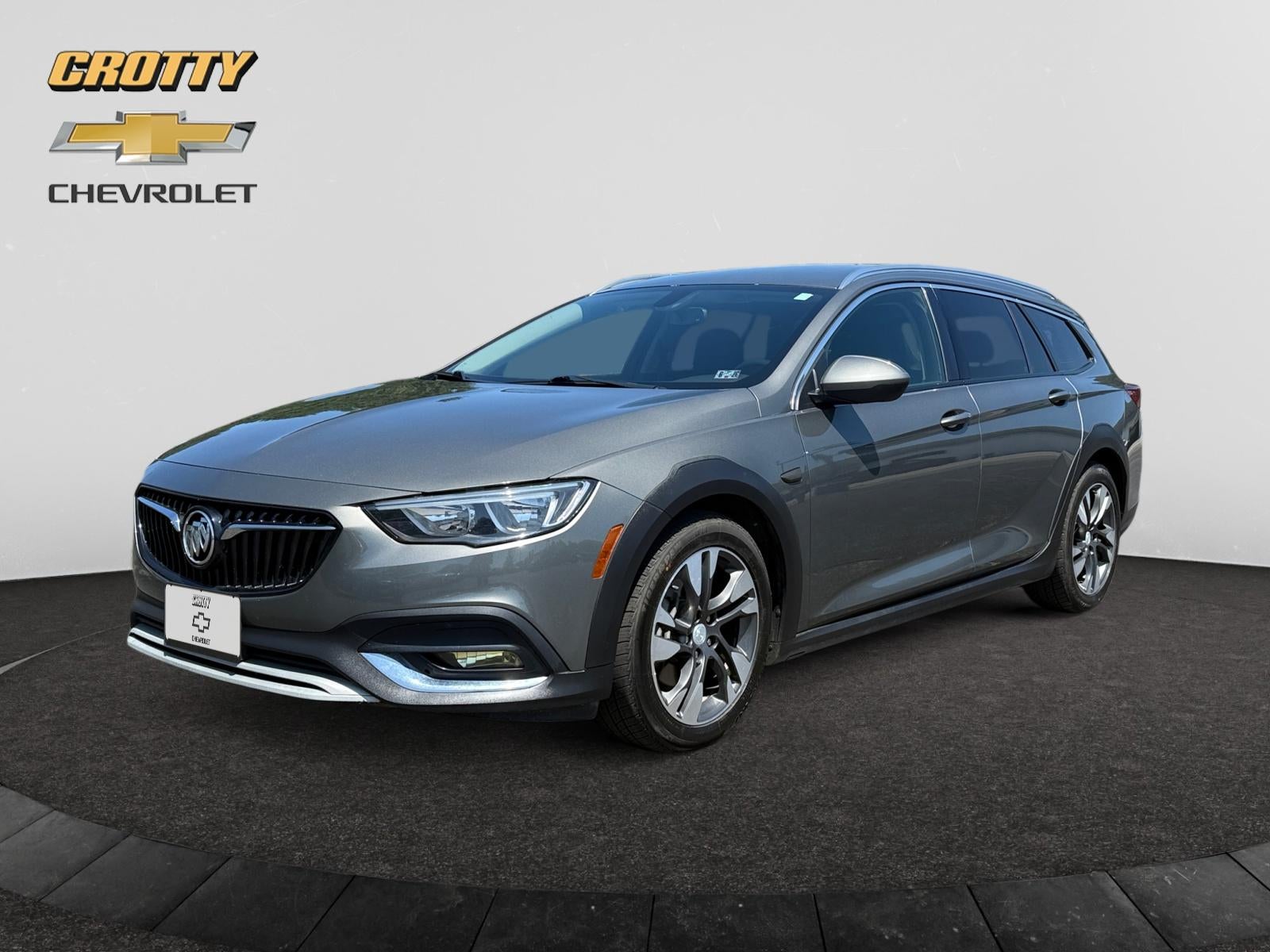 2018 Buick Regal TourX Essence in Smoked Pearl Metallic — front three-quarter view